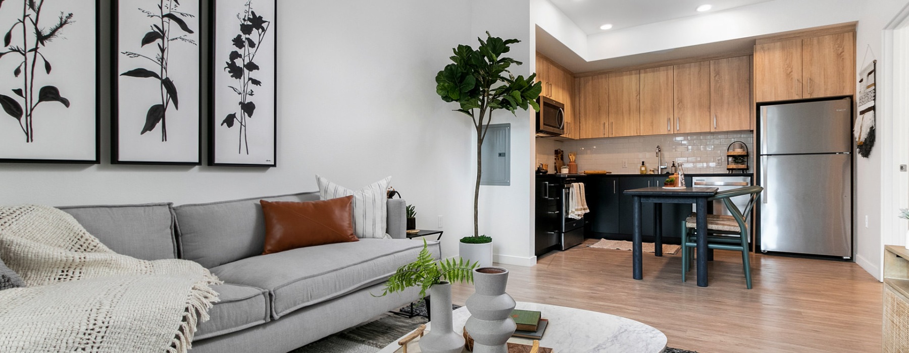 a living room with a couch and a table
