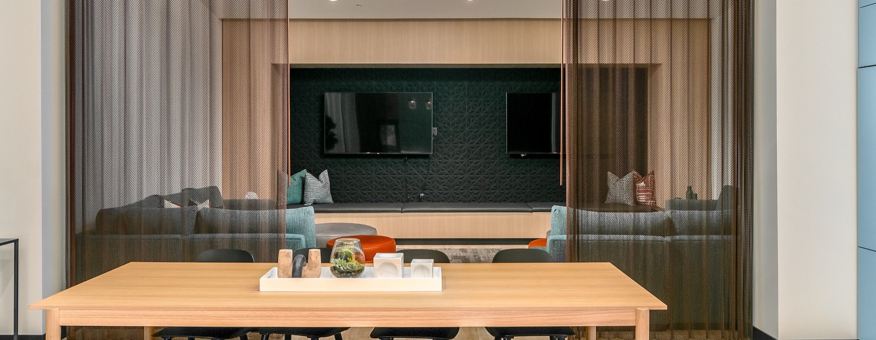a kitchen with a table and chairs