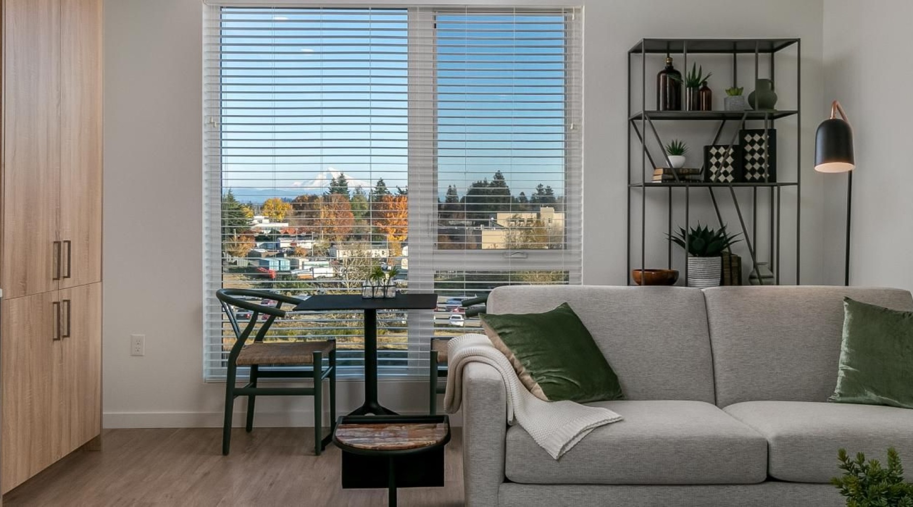 a living room with a couch and a table