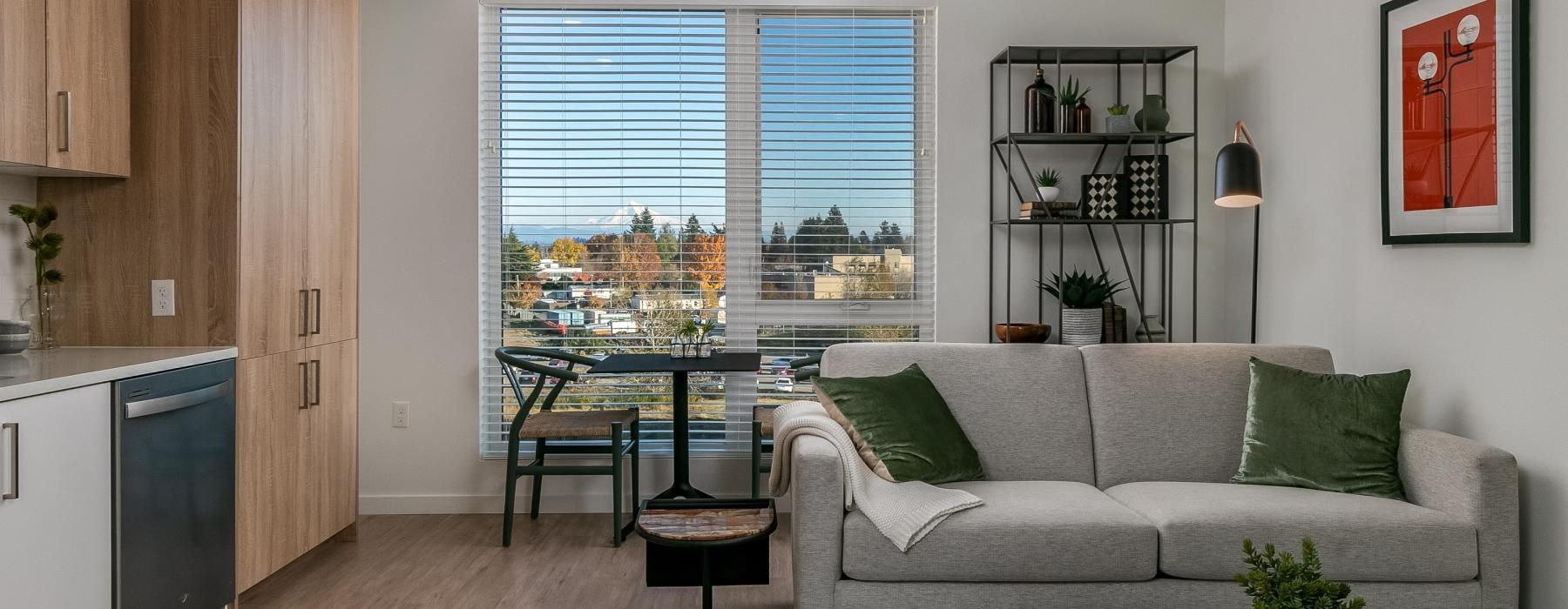 a living room with a couch and a table