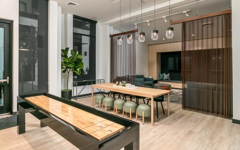 a room with a table and chairs
