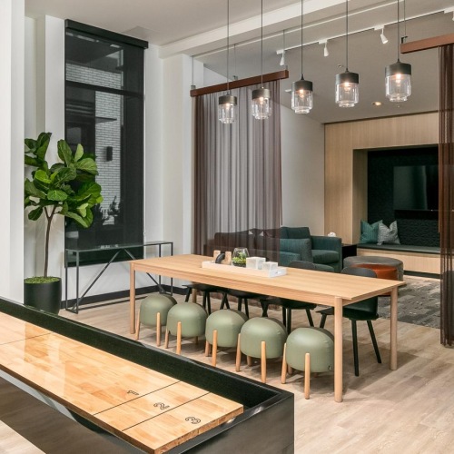 a room with a table and chairs